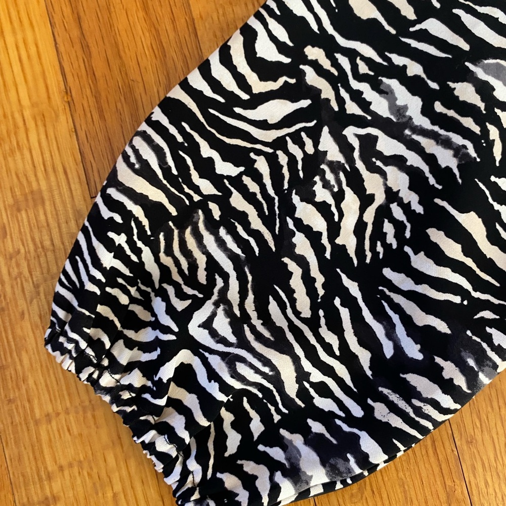 Mini side tie leopard dress with a front small ruffle